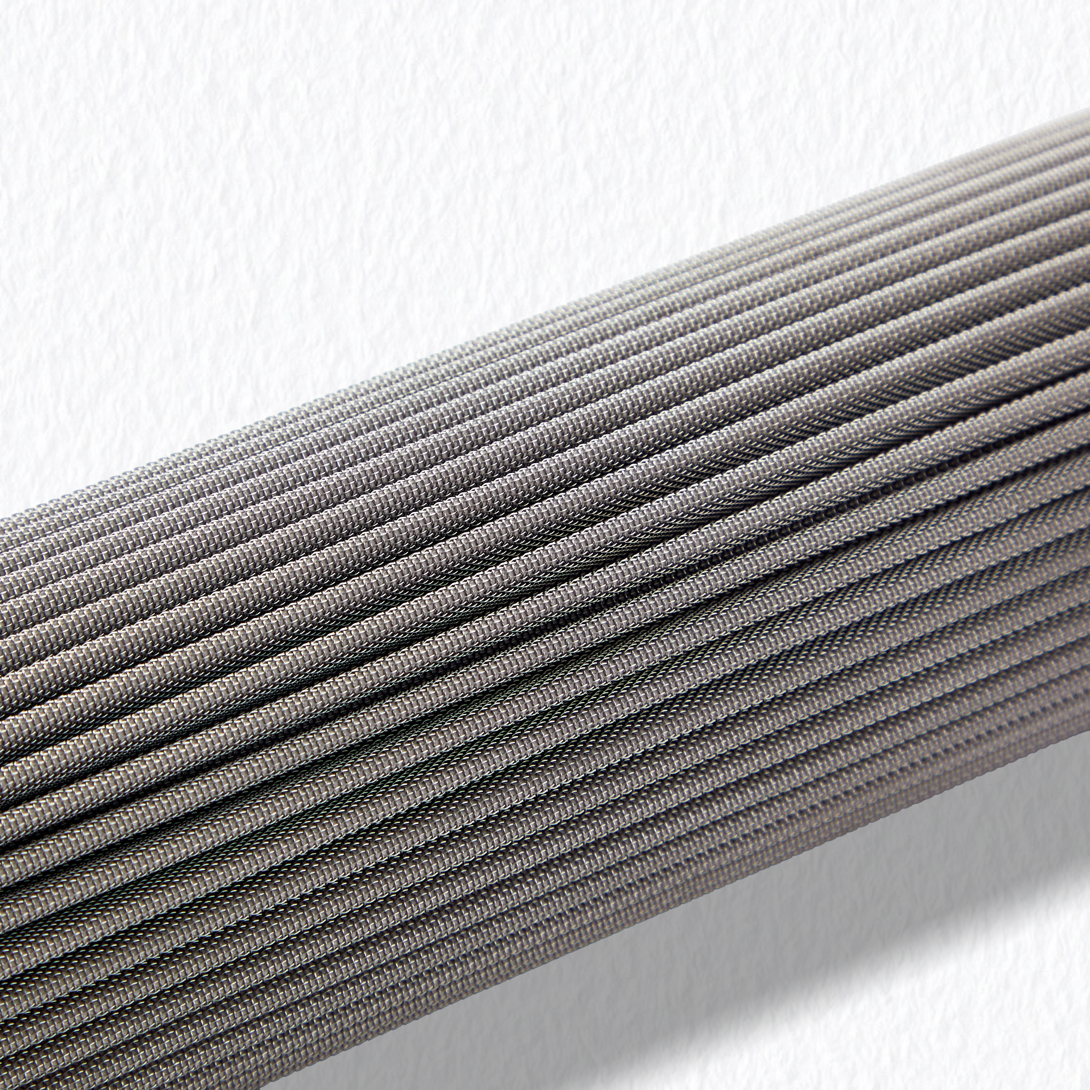 Macro view of the pleated Sintered Stainless Steel Fiber Felt media surface, showing deep porous structure for high dirt holding capacity and gel removal.